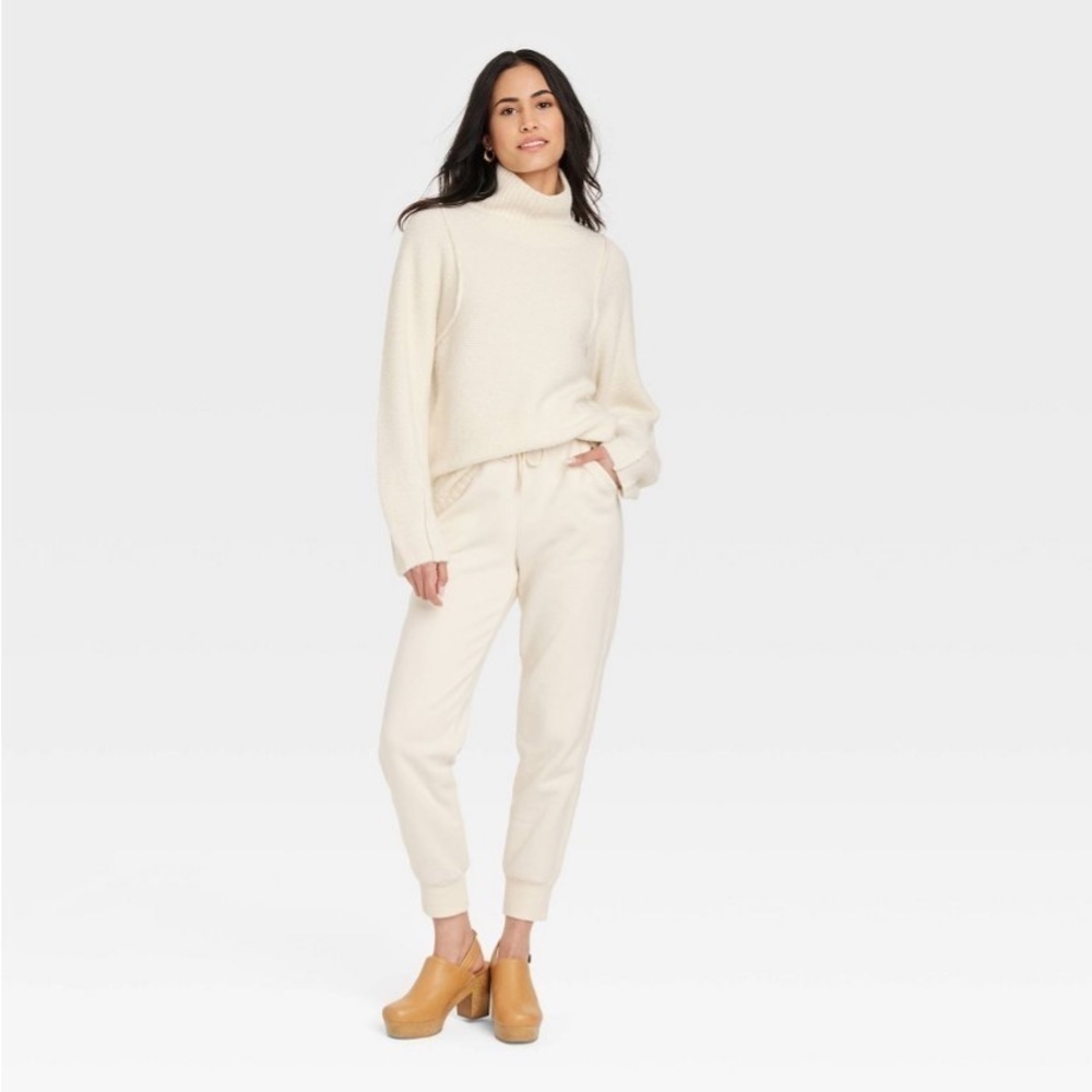 Women's Mock Turtleneck Seam Front Pullover
Sweater - Universal Thread